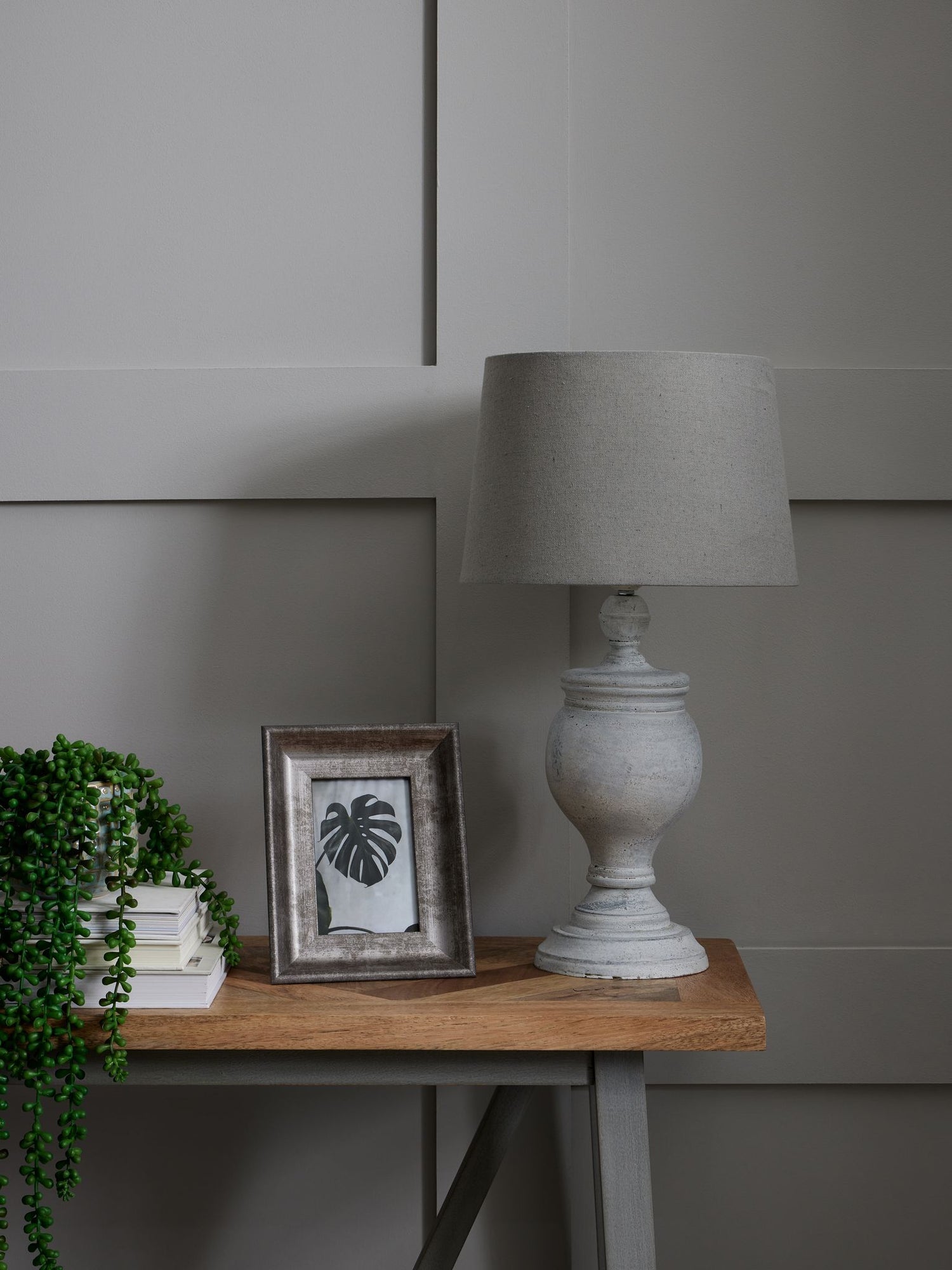 Grey Lamp On Wooden Table