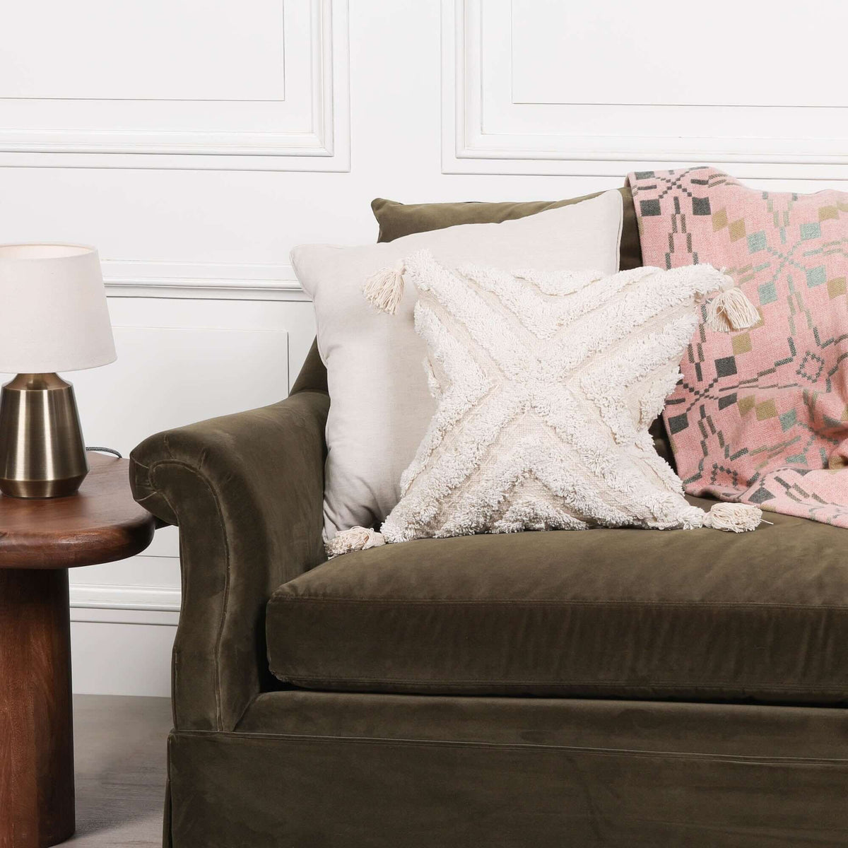 Boho Natural Cushion Cover 45cm on a cozy sofa with decorative pillows and a lamp.