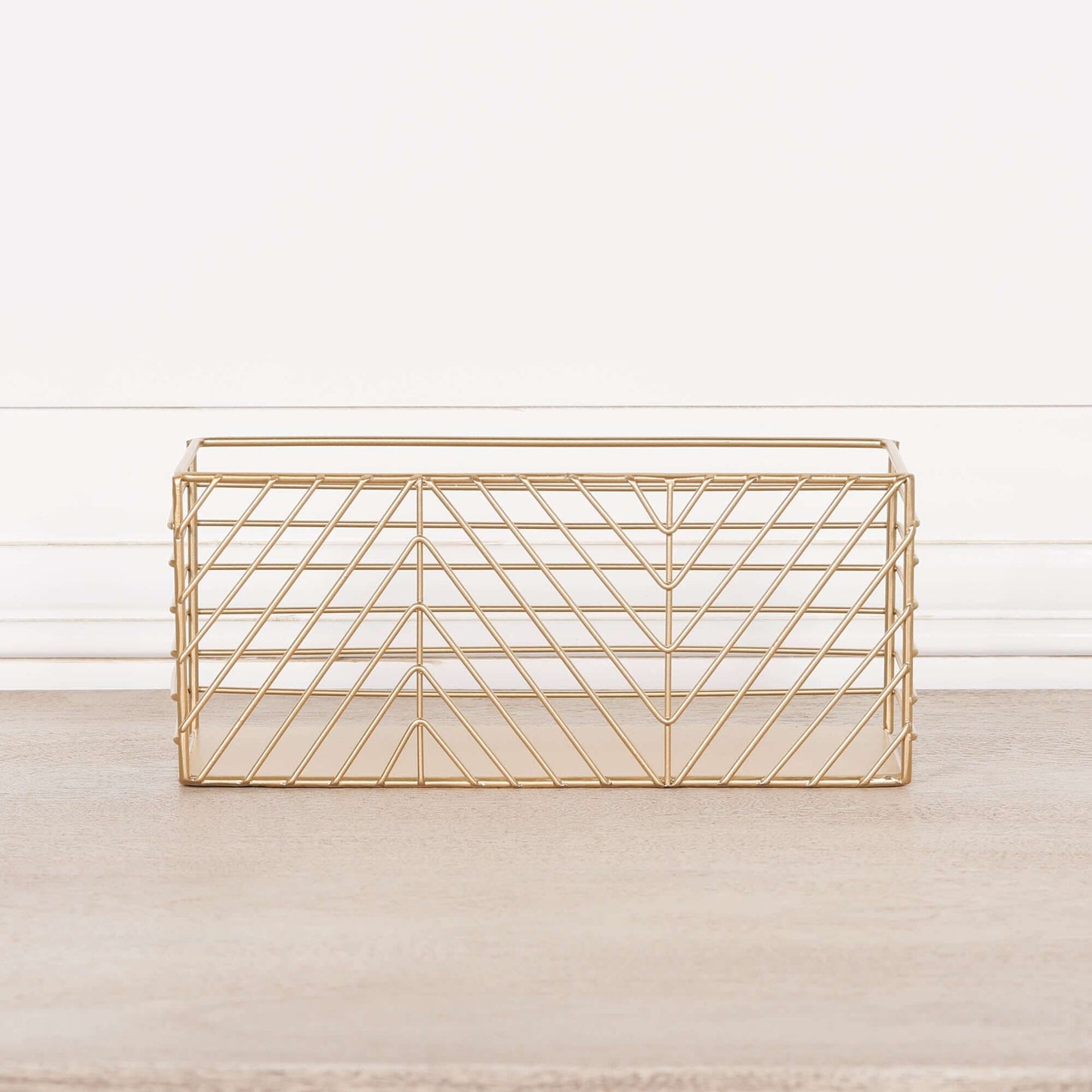 Gold metal storage basket for organising desks, kitchens, and bathrooms with a stylish geometric design.