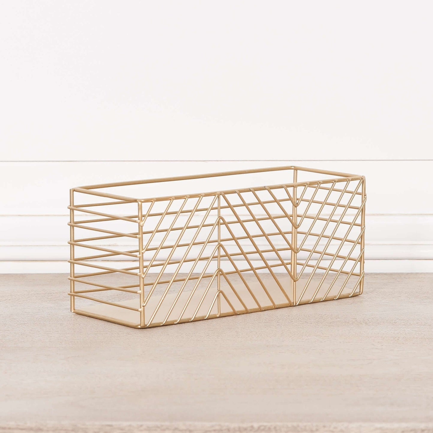 Gold metal storage basket for stylish desk, kitchen, or bathroom organisation.