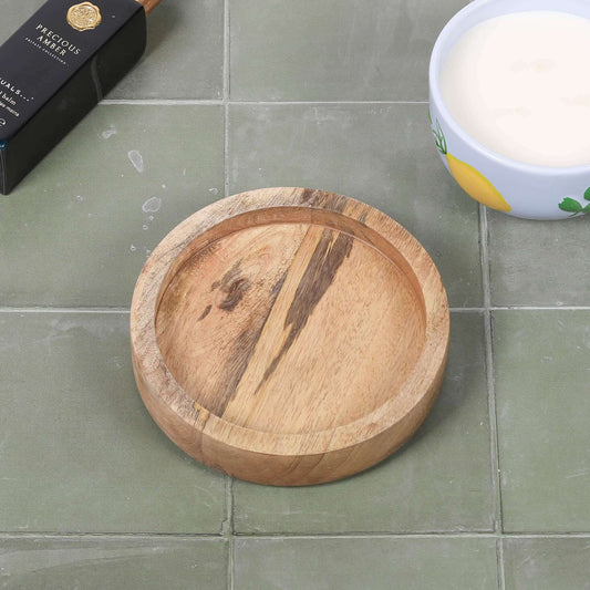 Round 15cm Wooden Tray showcasing its natural mango wood finish and round design.