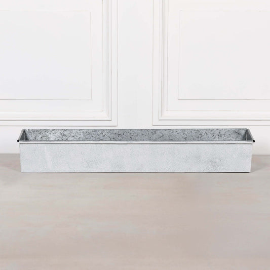 White wash metal window box planter roll top featuring a rustic distressed finish, ideal for plants and flowers.