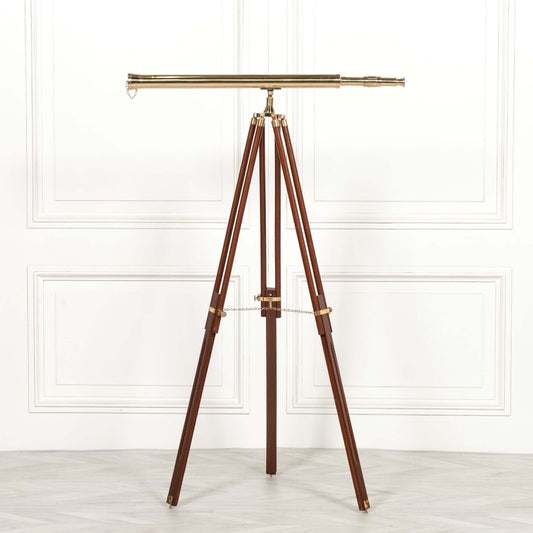 Brass Telescope On A Wooden Tripod Stand