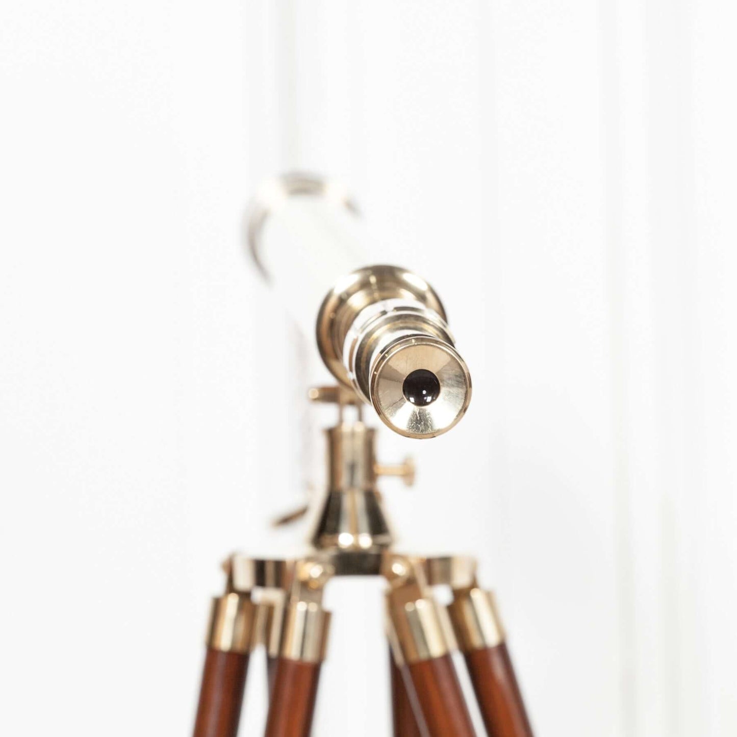 Brass Telescope On A Wooden Tripod Stand