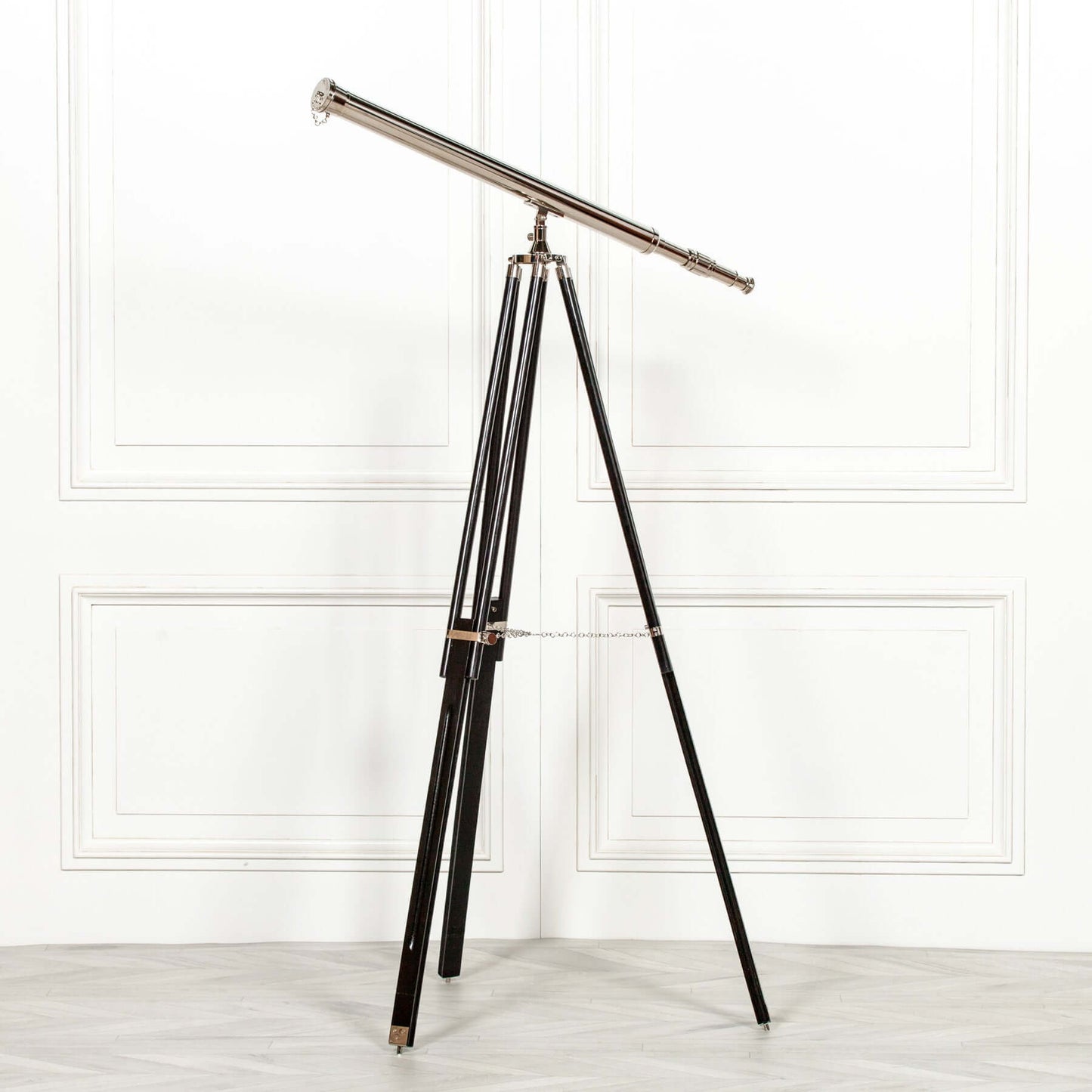 Nickel Tripod Telescope on Black Wooden Stand