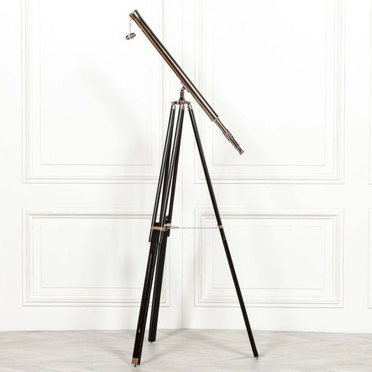 Nickel Tripod Telescope on Black Wooden Stand