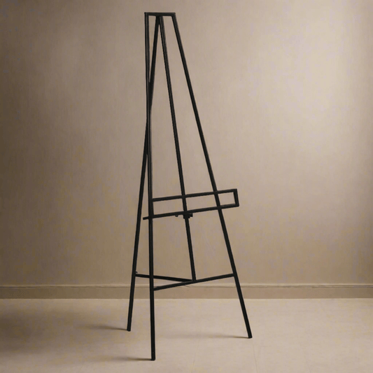 black minimalist easel against nude background