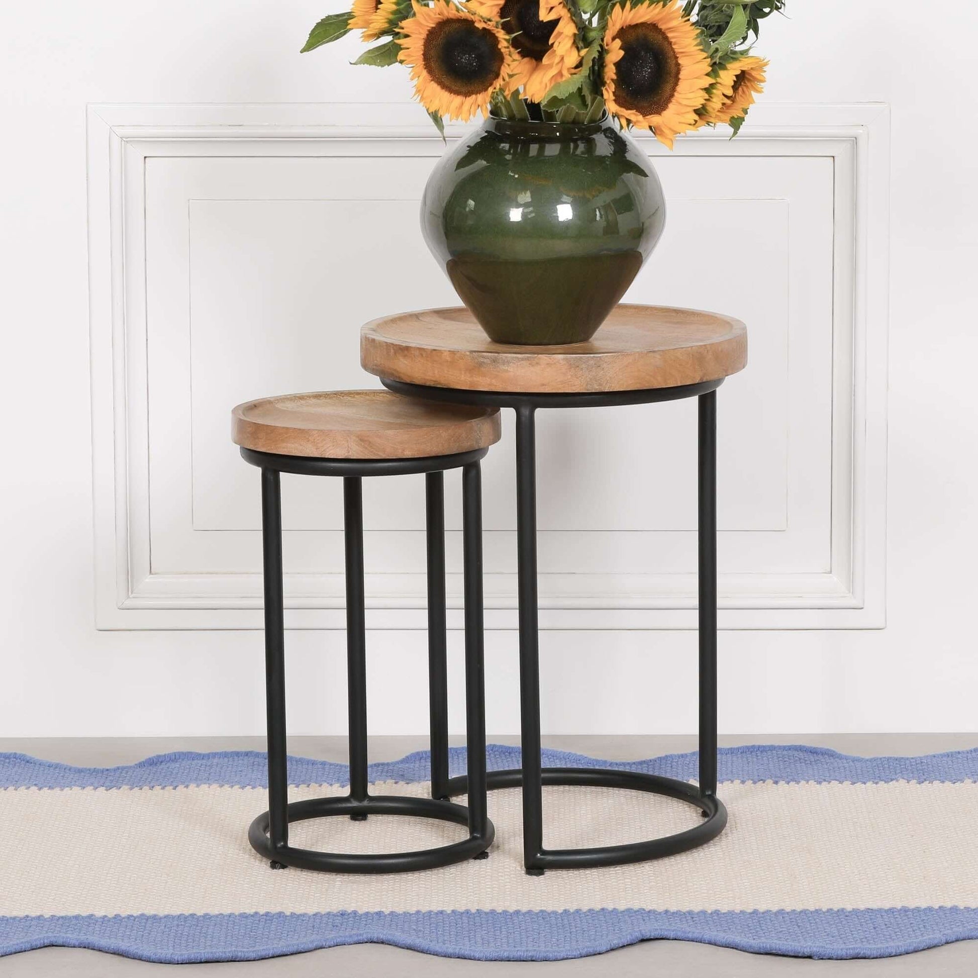 Iron Framed Nested Side Occasional Tables with Wooden Top featuring a vase of sunflowers.