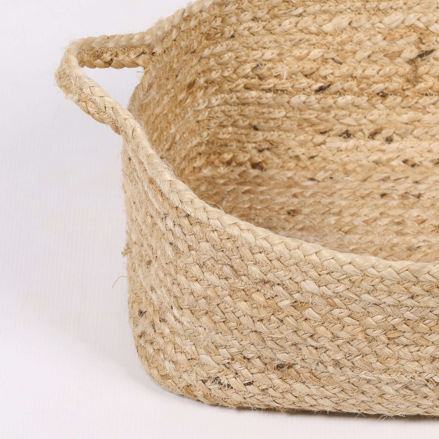 Jute Magazine Storage Basket made of natural jute, featuring sturdy handles, perfect for organizing magazines.