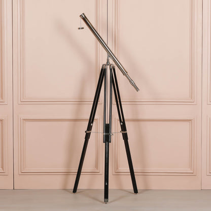 Nickel Telescope on Black Wooden Stand