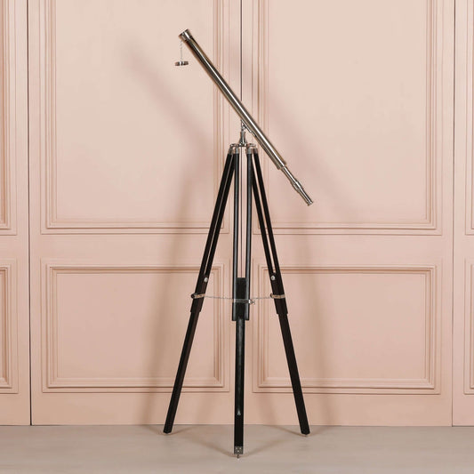 Nickel Telescope on Black Wooden Stand