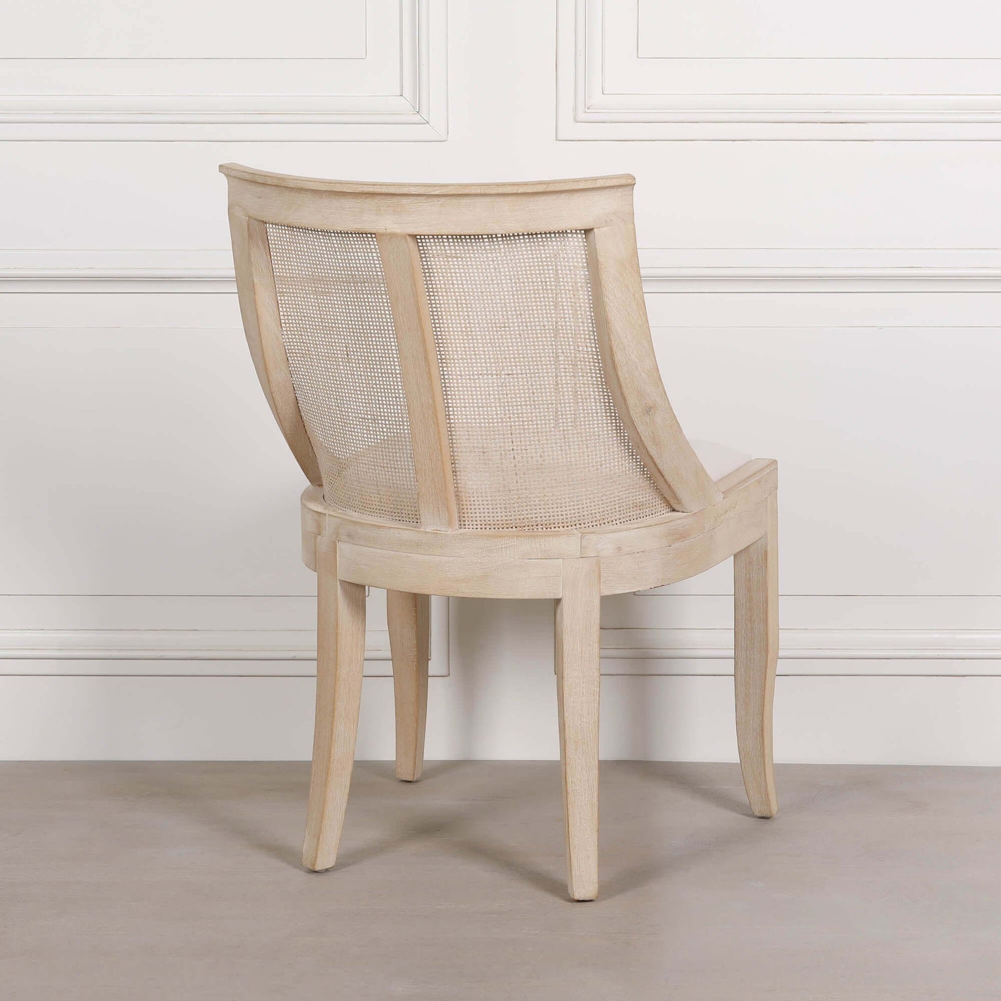 Light Wooden Sloped Rattan Upholstered Dining Chair