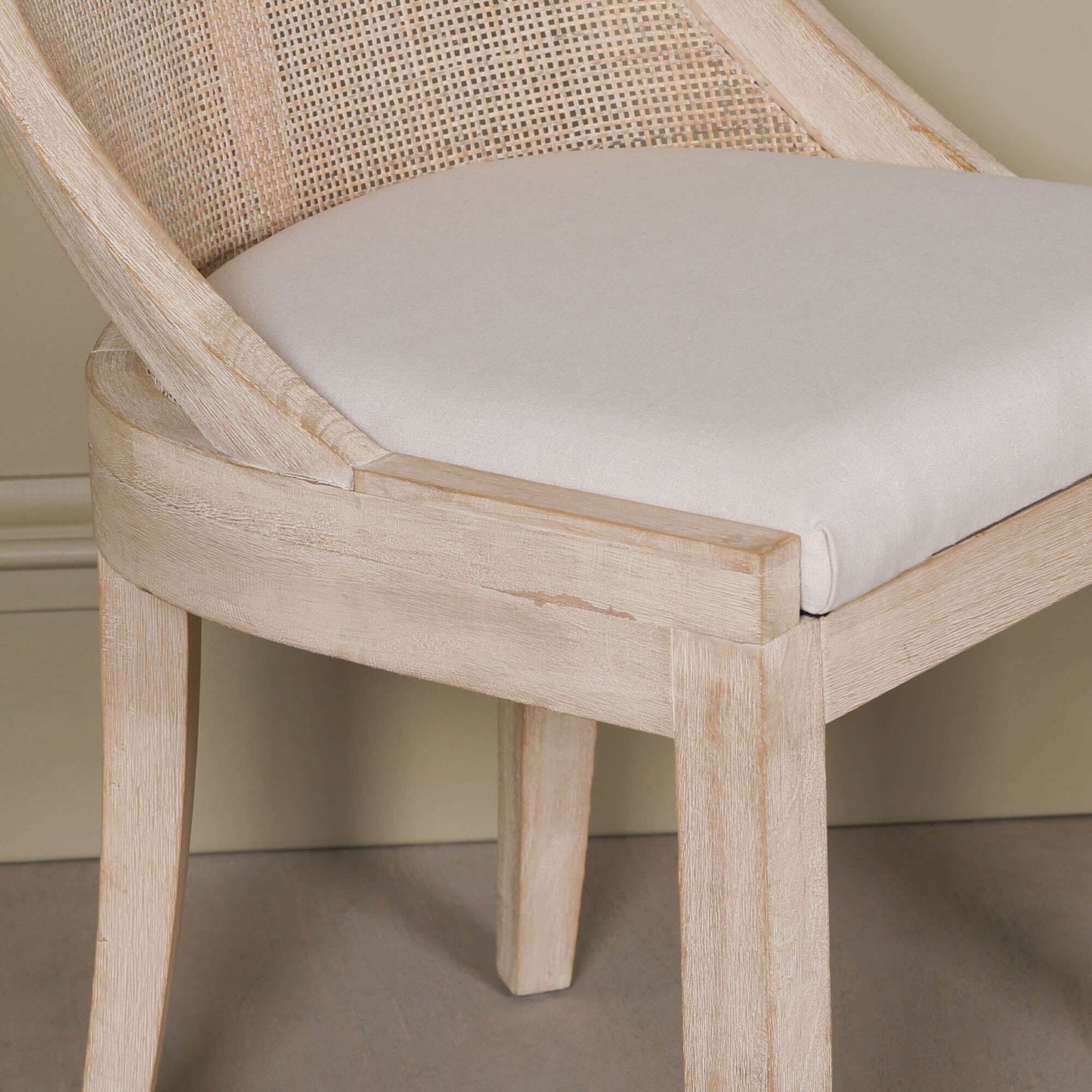 Light Wooden Sloped Rattan Upholstered Dining Chair