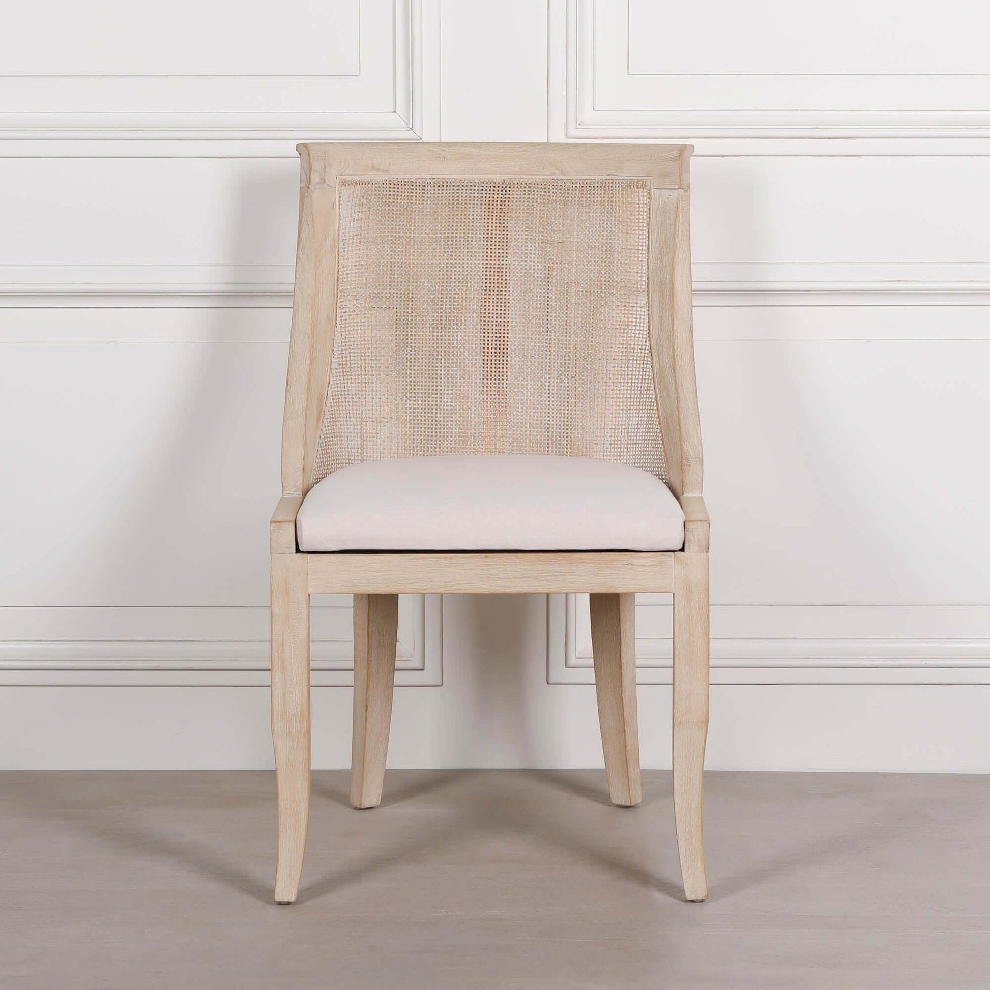 Light Wooden Sloped Rattan Upholstered Dining Chair
