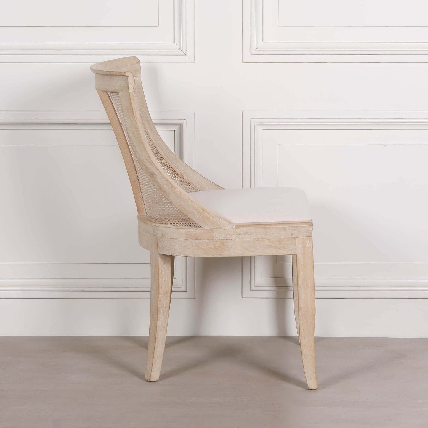 Light Wooden Sloped Rattan Upholstered Dining Chair