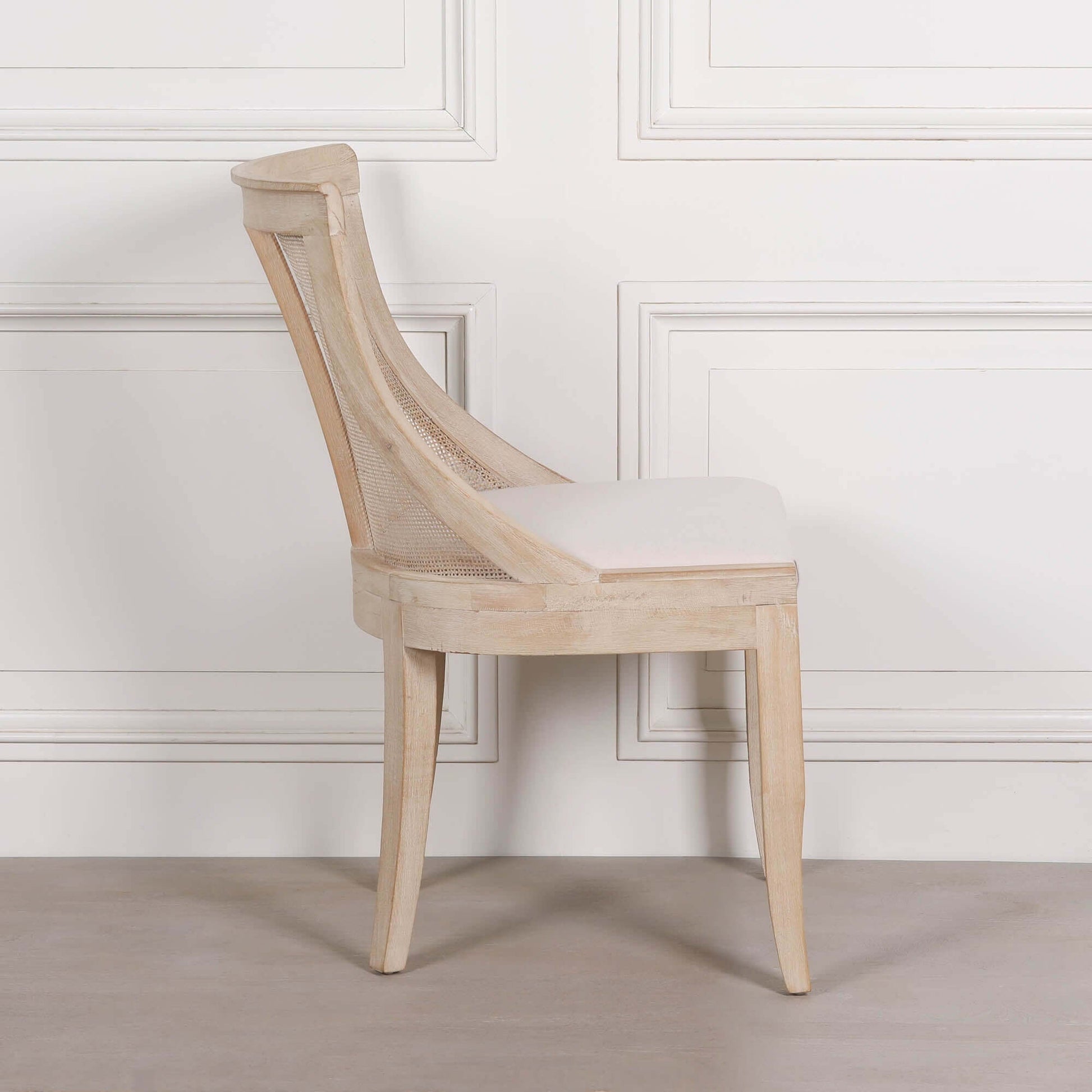 Light Wooden Sloped Rattan Upholstered Dining Chair