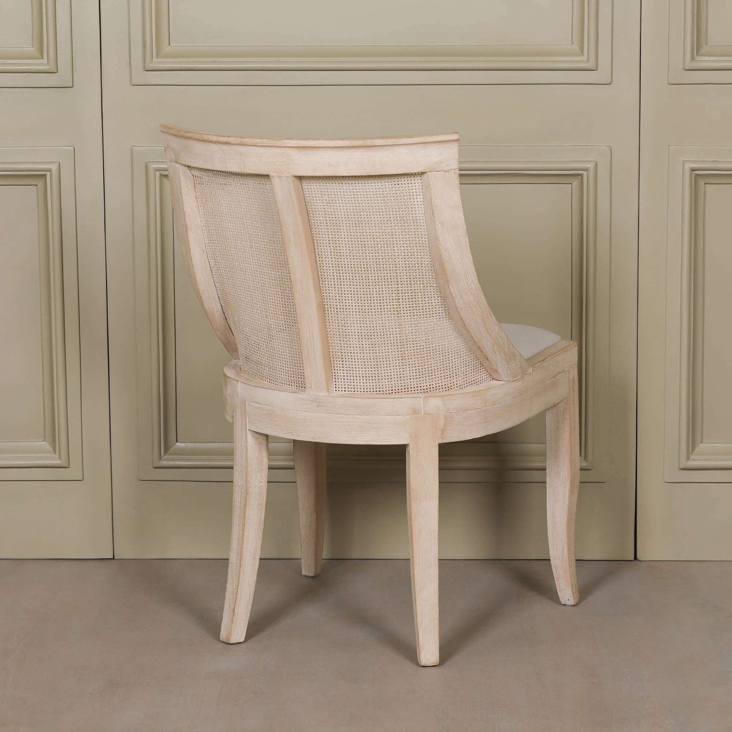Light Wooden Sloped Rattan Upholstered Dining Chair