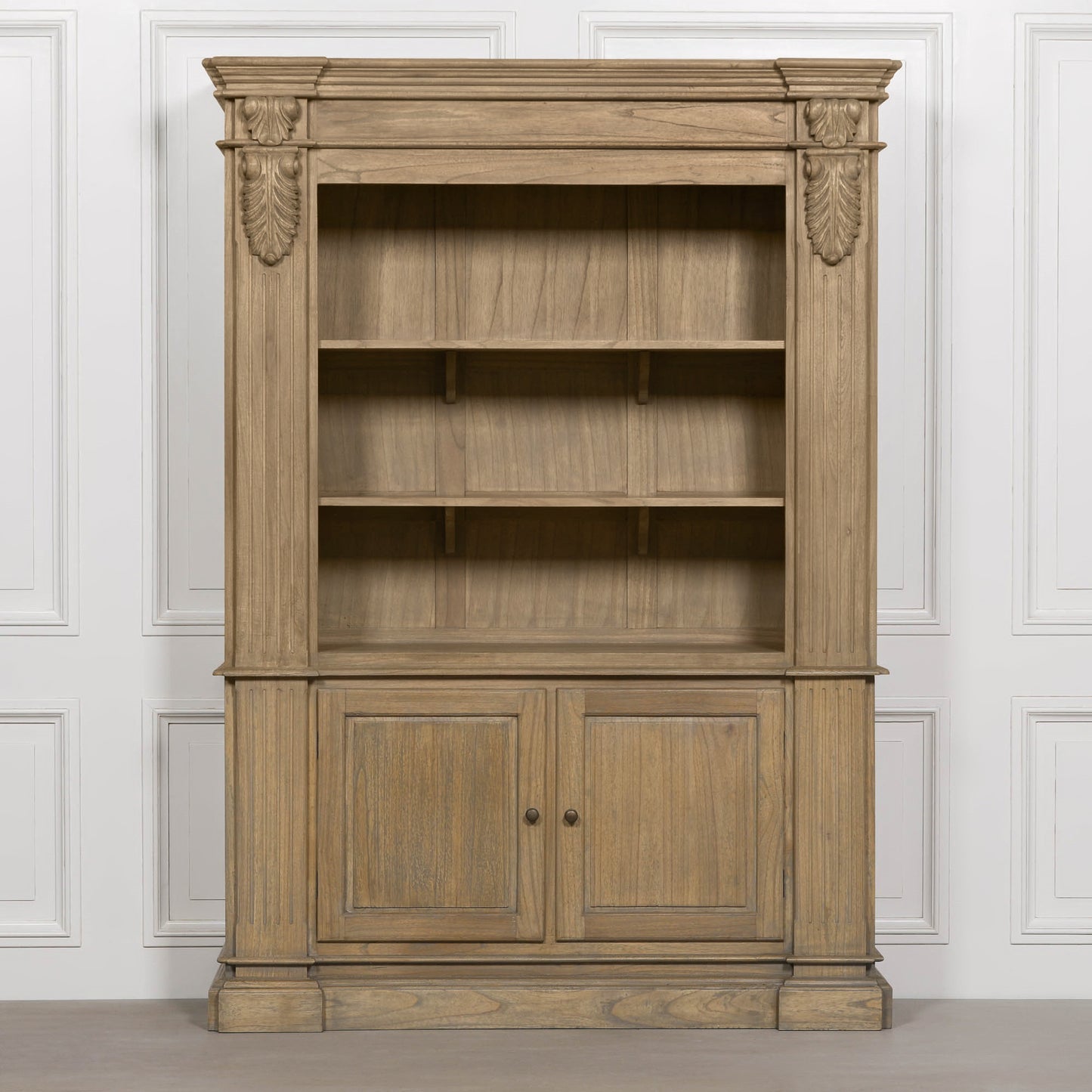 Large White Cedar Open Bookcase with Hand-Carved Corbel Details showcasing open shelves and lower cupboards.