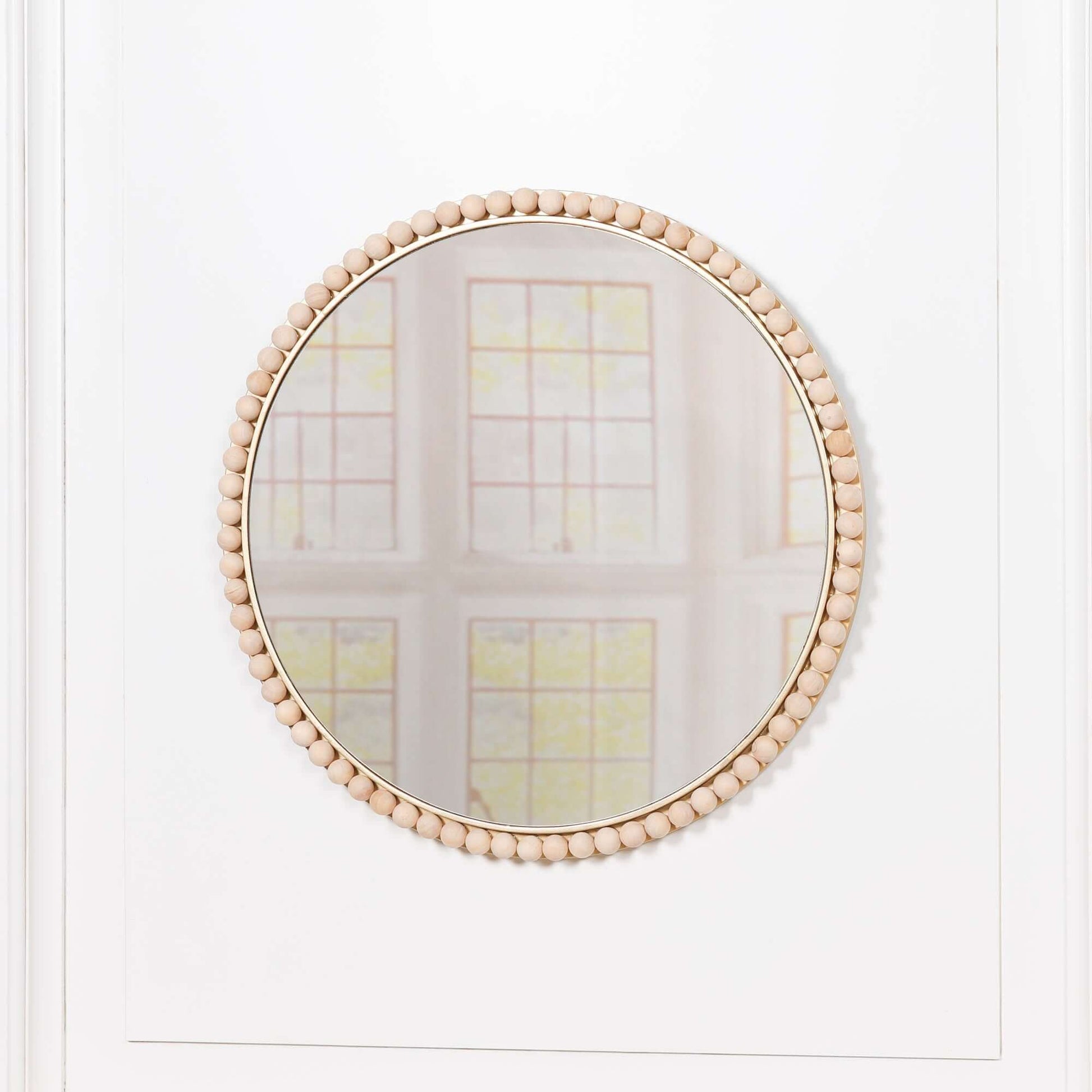 Wooden Bobble Round Wall Mirror with wood beads and glass in round shape, measuring H50 x W50 x D3cm.