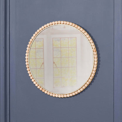 Wooden Bobble Round Wall Mirror with wooden beads and glass, dimension H50 x W50 x D3cm on a blue wall